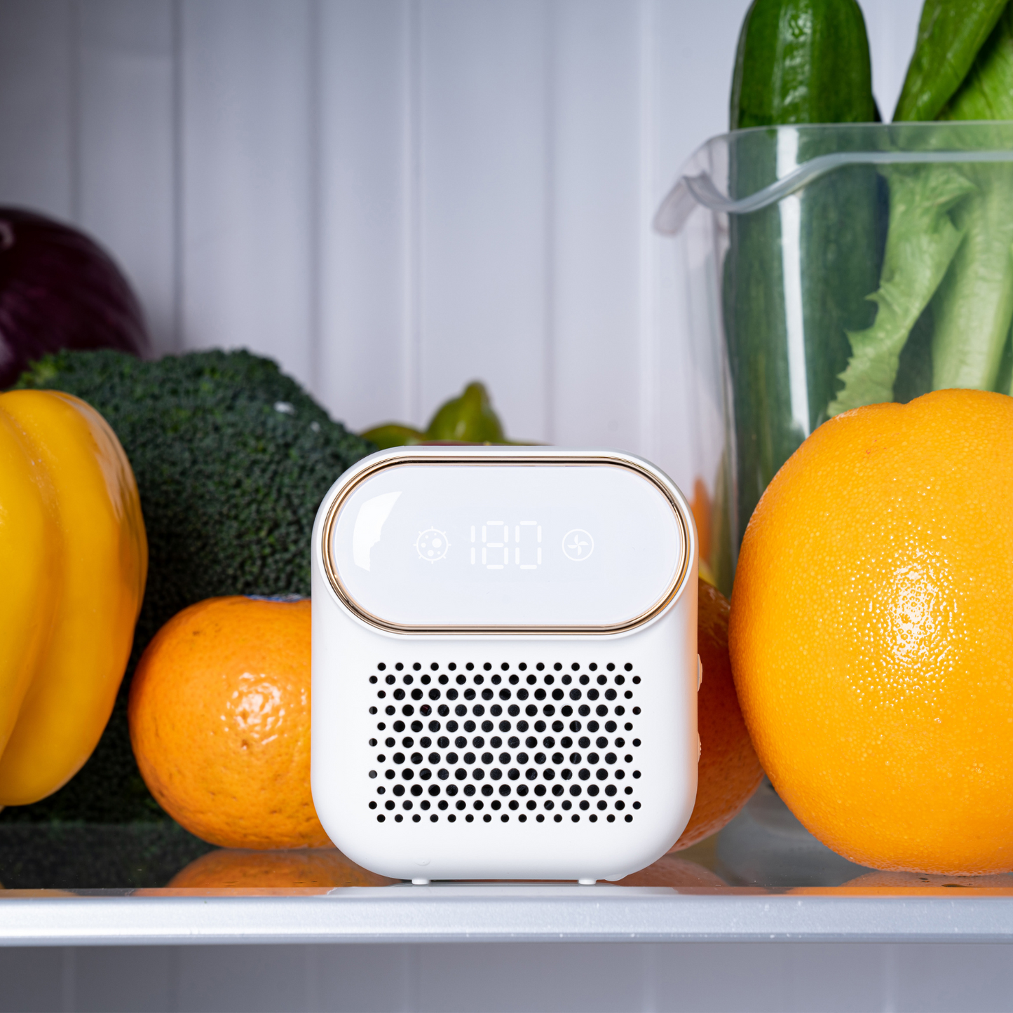 Fridge air purifier on fruits shelf in the fridge